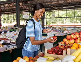 a woman at a farmers market