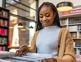 young woman shopping for records